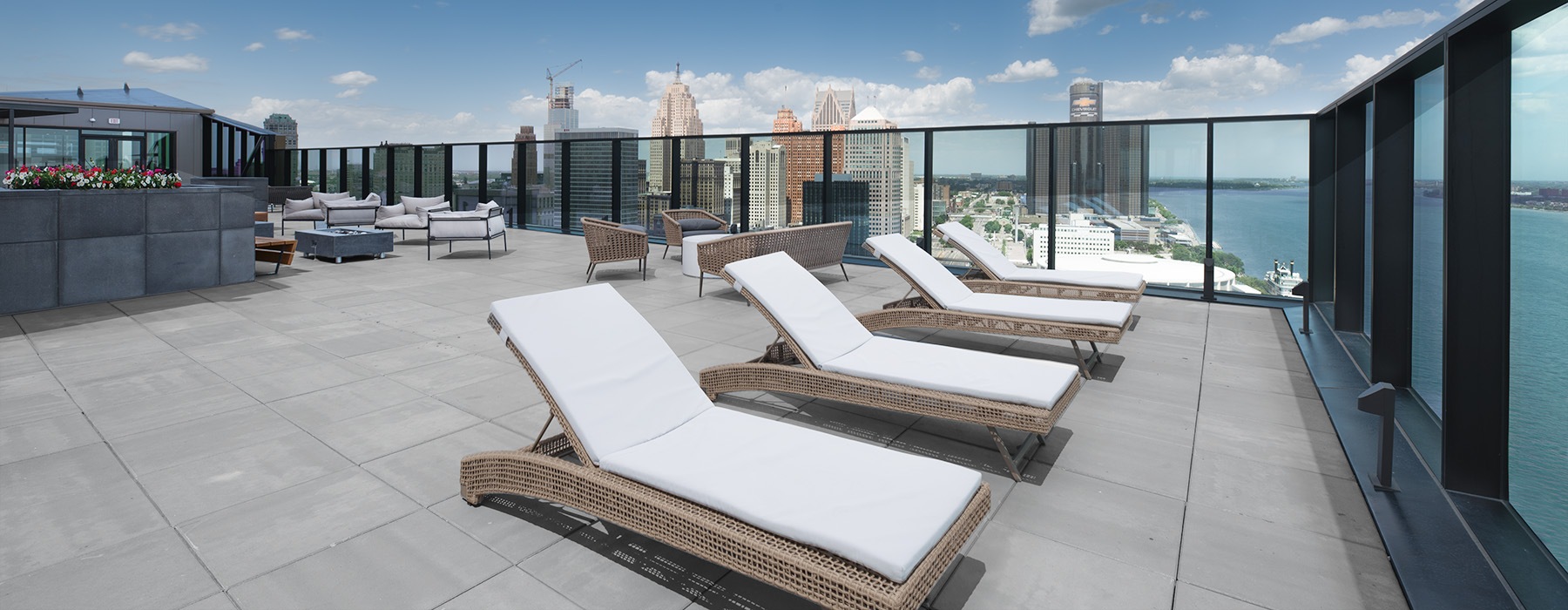 Rooftop patio deck with views of the Detroit Skyline