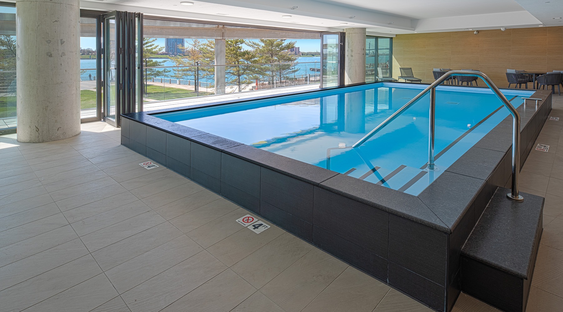 parallax All season pool with sliding glass doors open to viewing deck